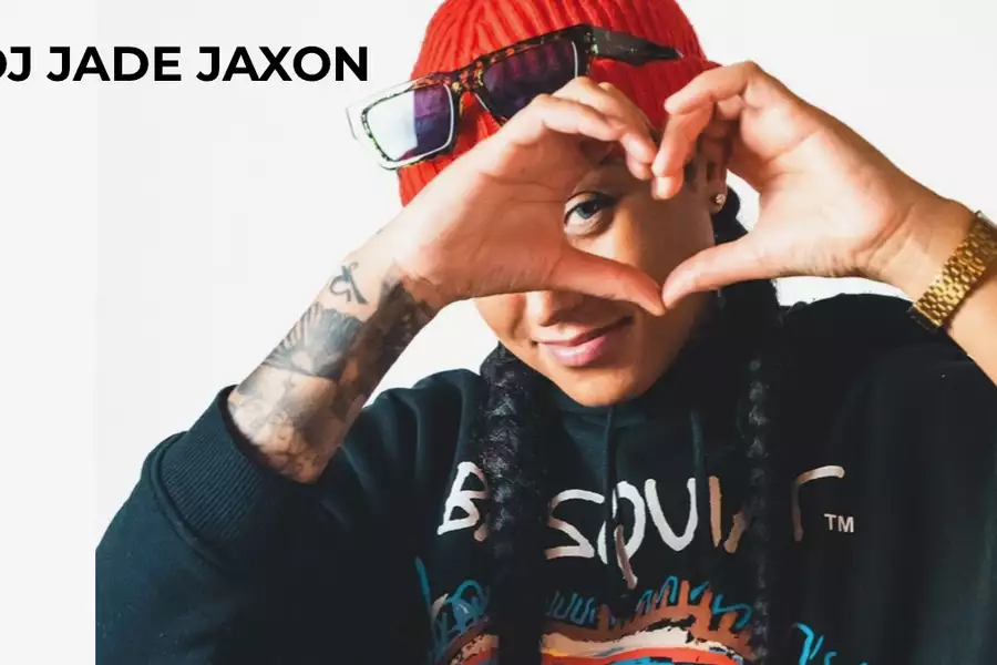 Photo of Jade Jaxon making a love heart with their hands. Text reads 'DJ Jade Jaxon'