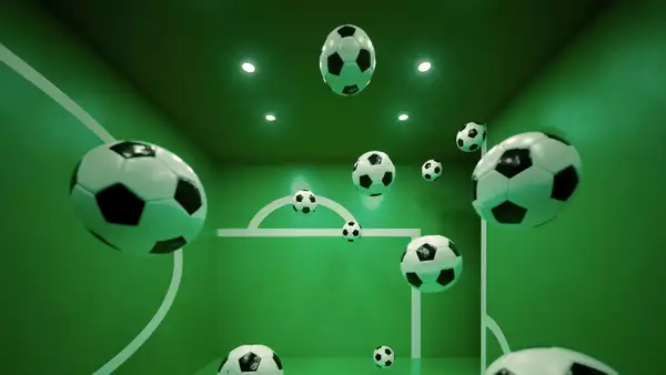 Multiple floating soccer balls inside a green room with white goalpost markings on the walls. The perspective and reflections create an illusion of depth, making it appear as if the balls are suspended in mid-air.