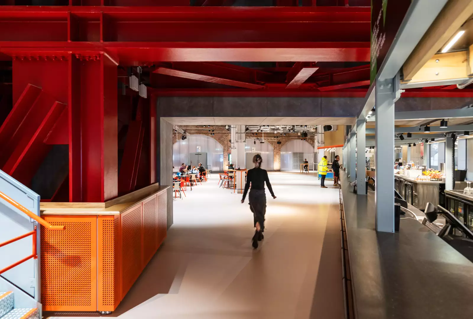 Photo of a visitor walking into the Social