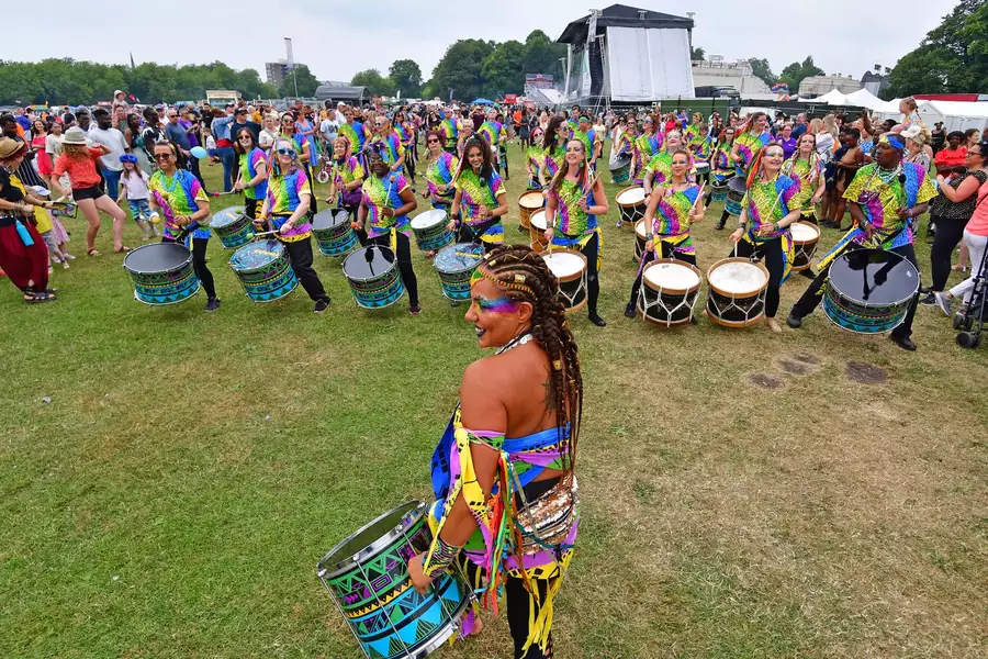 Drummers from Katumba performing outside in a park