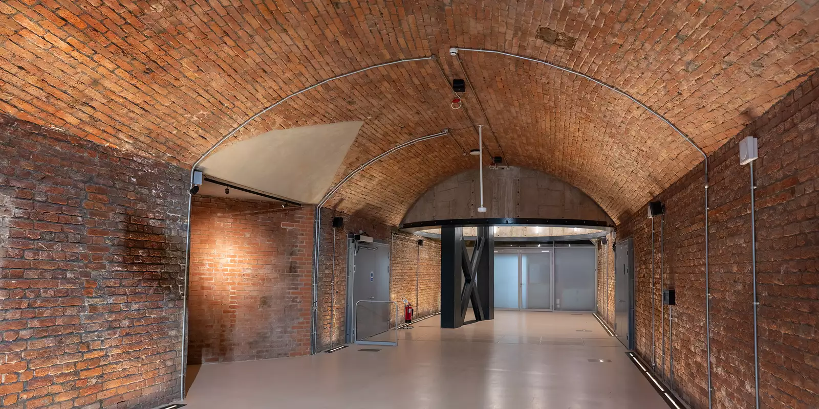 The Archway in the Social at Aviva Studios, showing an empty brick archway