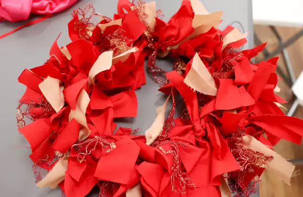 A red fabric wreath by Stitched Up