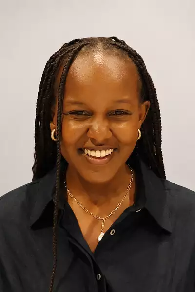 Headshot of Linda Wachaga smiling
