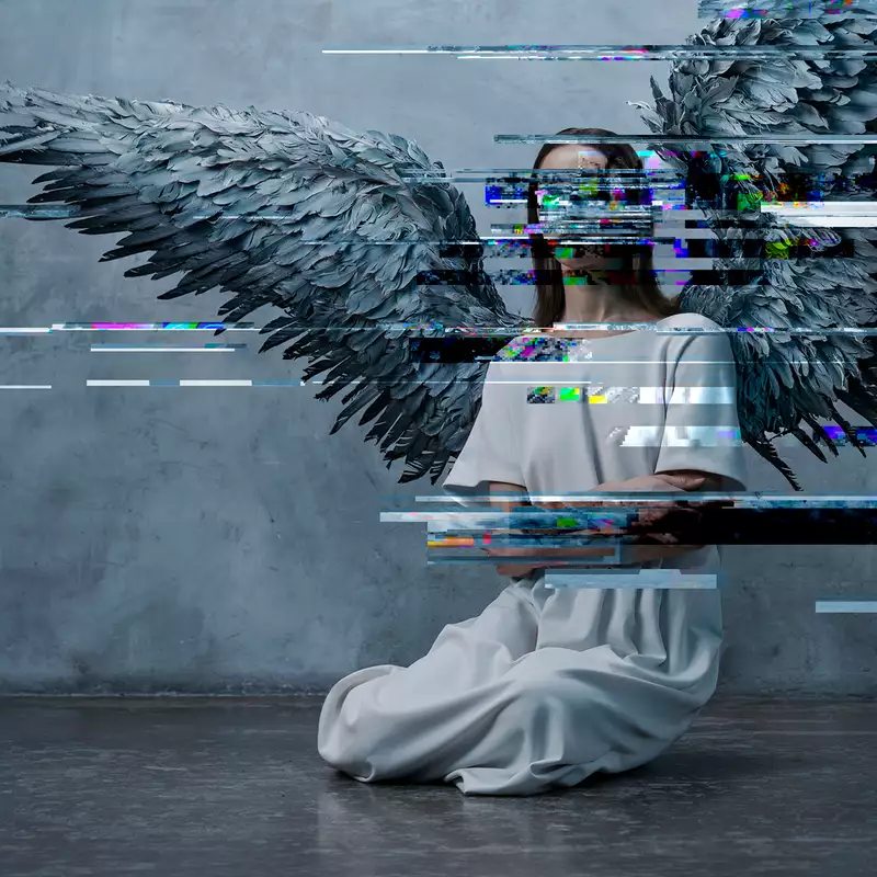 An angel cowers in a corner with glitchy effect