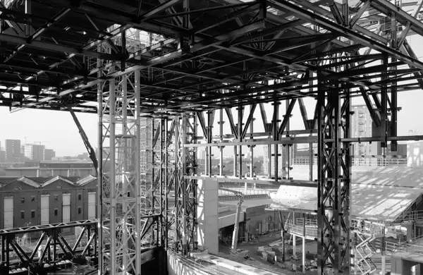 Black and white photograph by Hélène Binet showing the construction of Aviva Studios