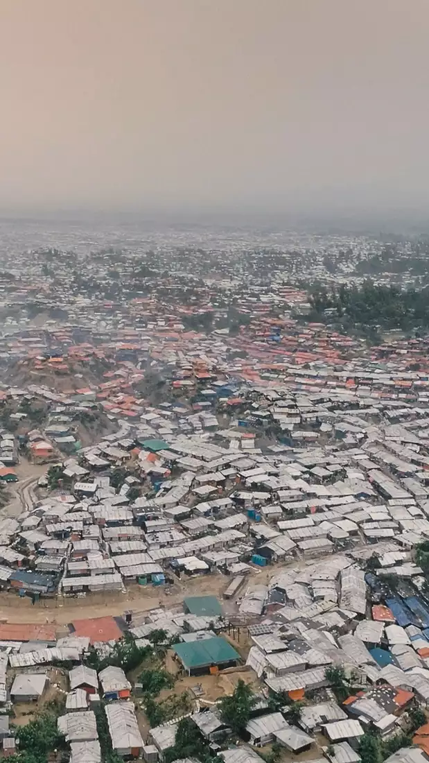 Still from Ai Weiwei's film 'Rohingya' showing an aerial view of a large refugee camp