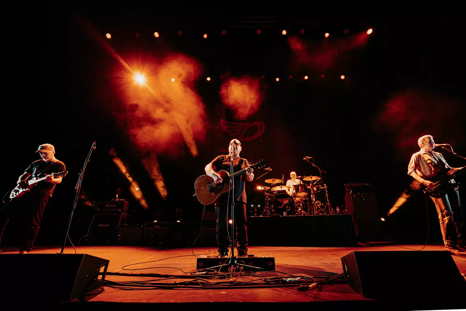 Pixies on stage in the Hall with red lighting