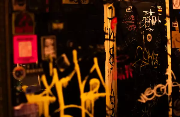 Graffiti on a mirror in the toilets at the DBA