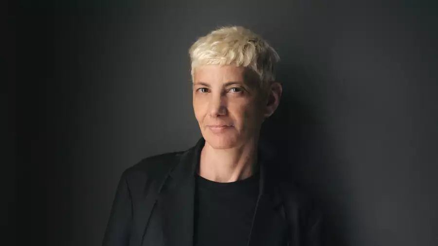 Headshot of Yael Bartana on a black background