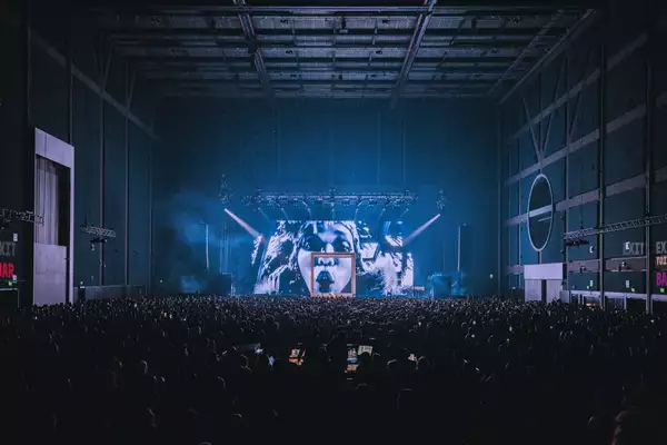 A huge crowd in the Warehouse watching FKA twigs on stage