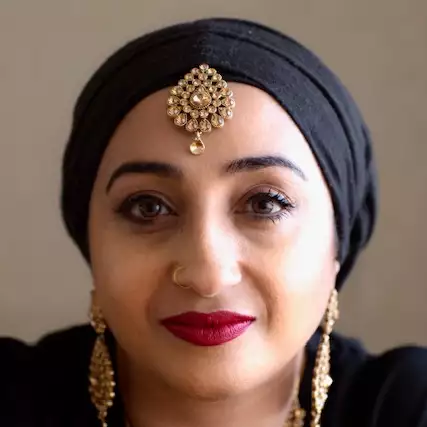 Headshot of Hafsah Aneela Bashir on a neutral background