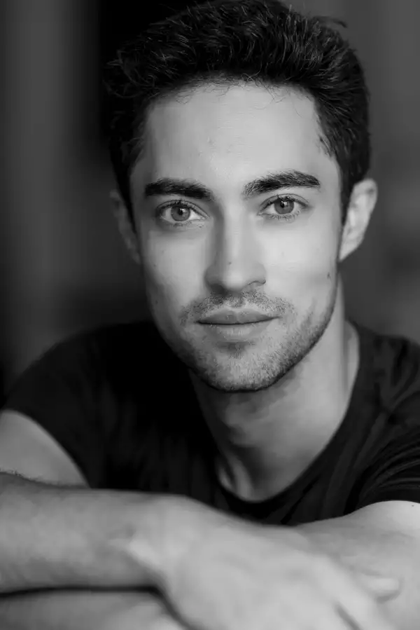 Black and white headshot of James Hay