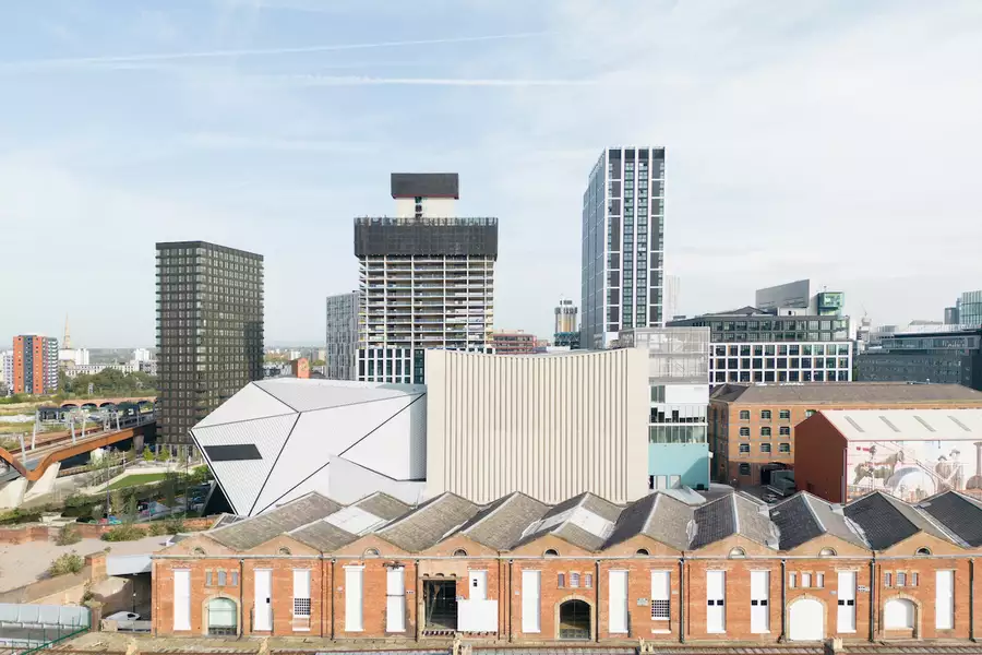 Aviva Studios and Manchester skyline viewed from a distance
