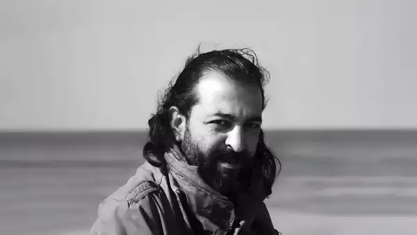 Black and white photo of Shareef Sarhan