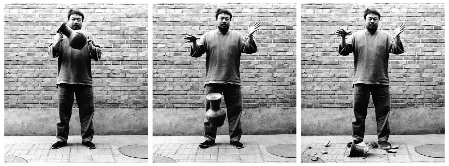 Ai Weiwei's artwork Dropping a Han Dynasty Urn  – a black and white triptych of the artist dropping an urn