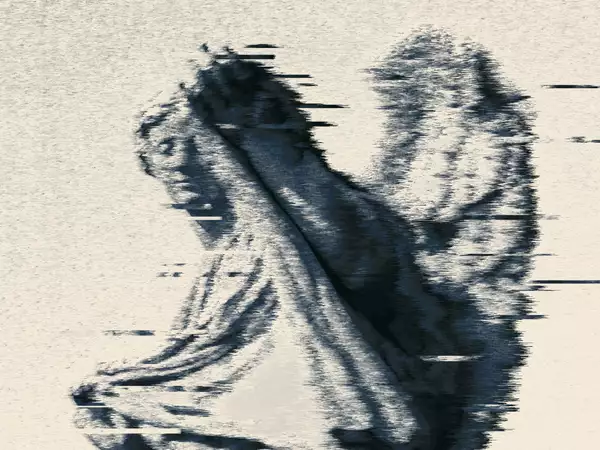 Glitch-style monochrome portrait of an angel with wings