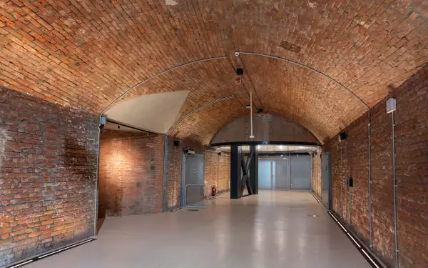 The Archway in the Social at Aviva Studios, showing an empty brick archway