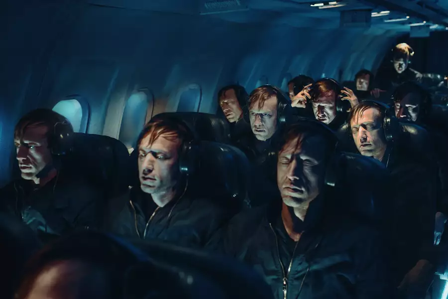 A surreal airplane cabin filled with identical men wearing headphones.