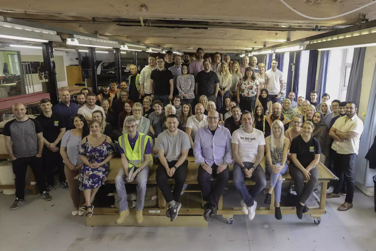 Group photo of workers from J&C Joel