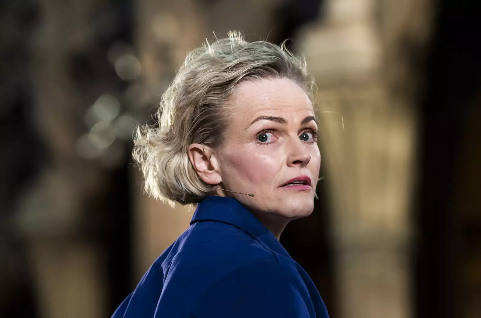 Photo of Maxine Peake looking over her shoulder