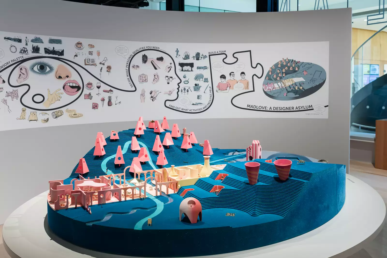 A colourful model of a designer hospital on display in an exhibition