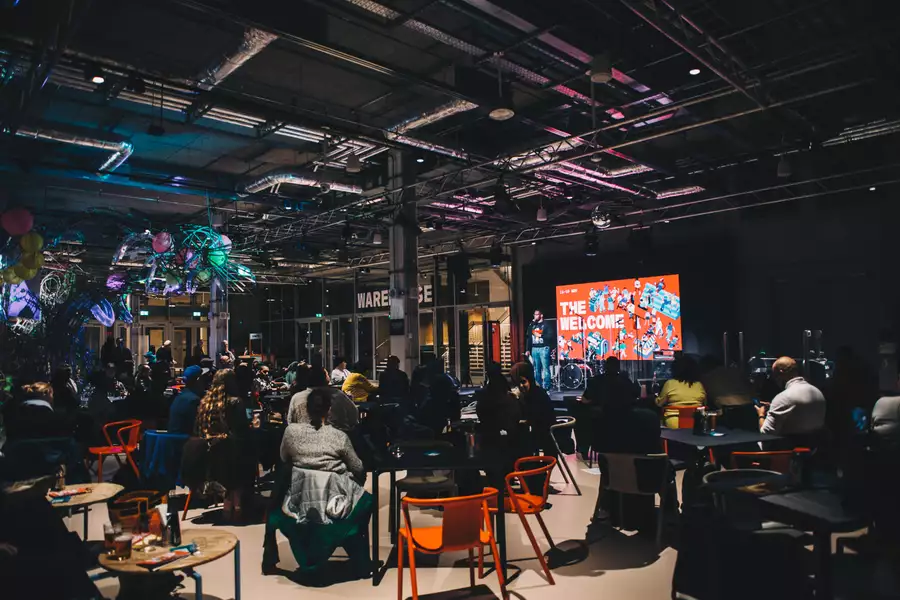 People watching spoken word poetry in the Social at Aviva Studios