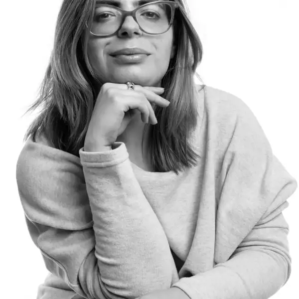 Black and white headshot of Chloe de Lullington