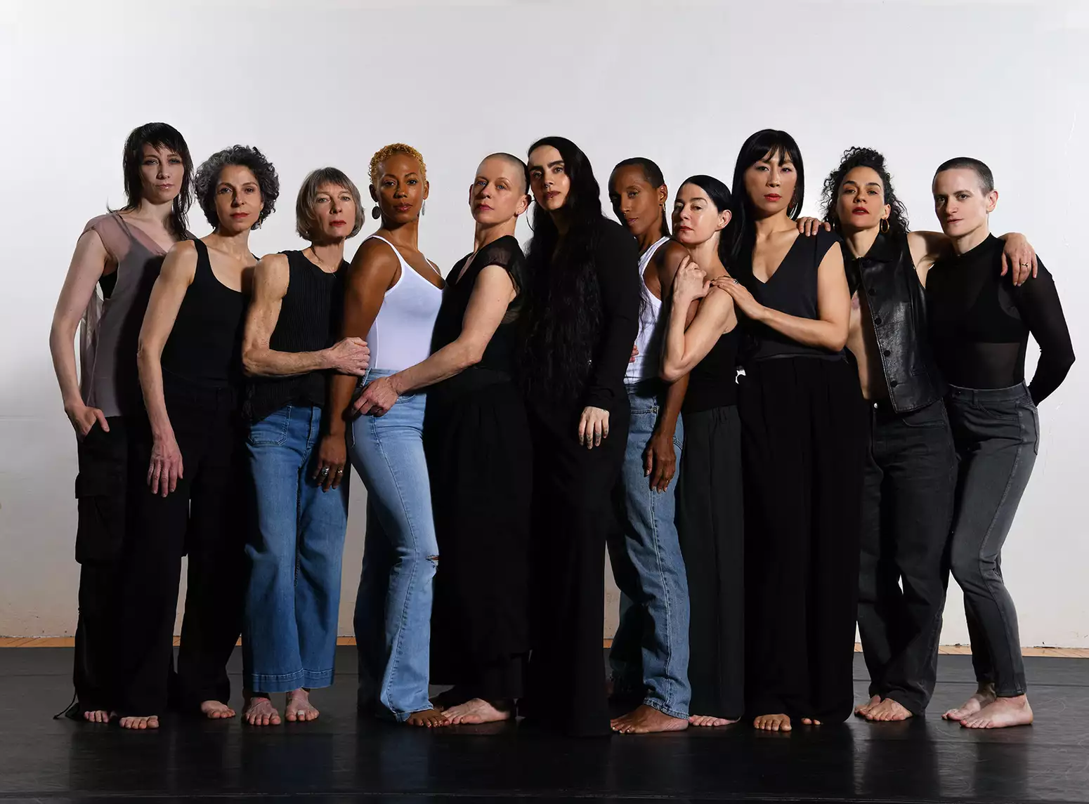 Group photo of Sonya Tayeh with the dancers in the Surge