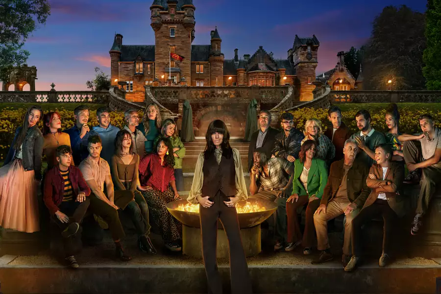 Claudia Winkelman and the Traitors cast stood outside the castle at night