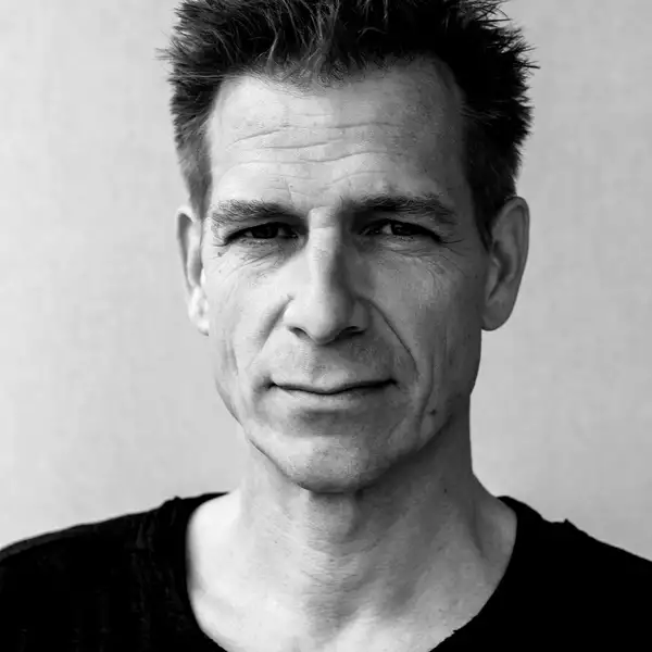 Black and white headshot of Urs Schönebaum