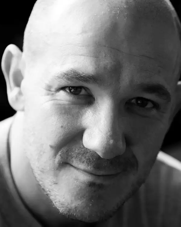 Black and white headshot of STEVEN HOGGETT