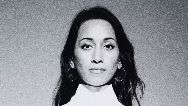 Black and white grainy headshot of Abi Sampa