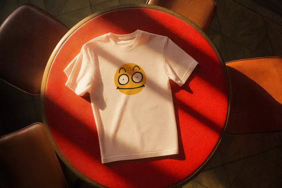 A white t-shirt on a red table