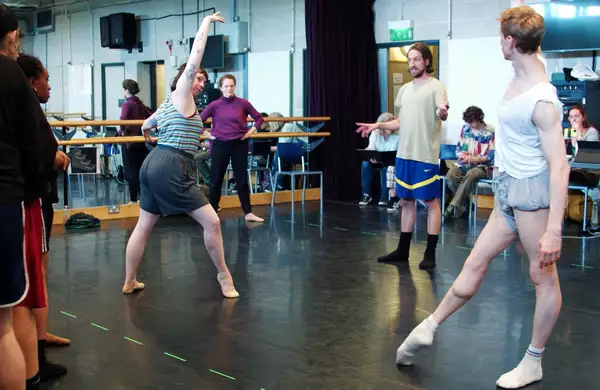 A busy rehearsal room for A Single Man, with dancers being directed by Jonathan Watkins