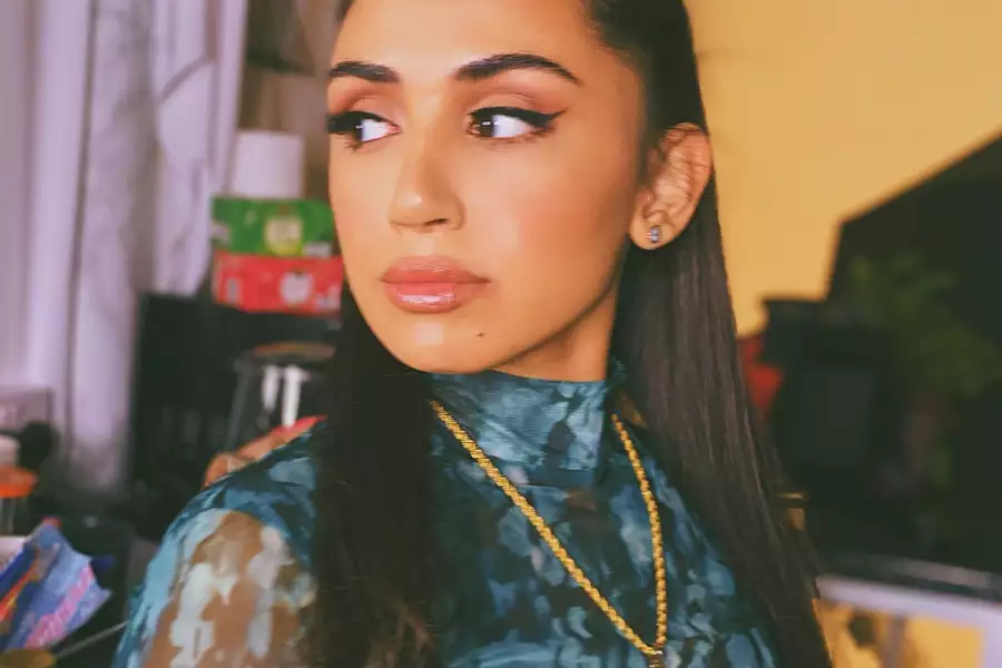 portrait of Hana Malik - candid shot of her looking away from camera