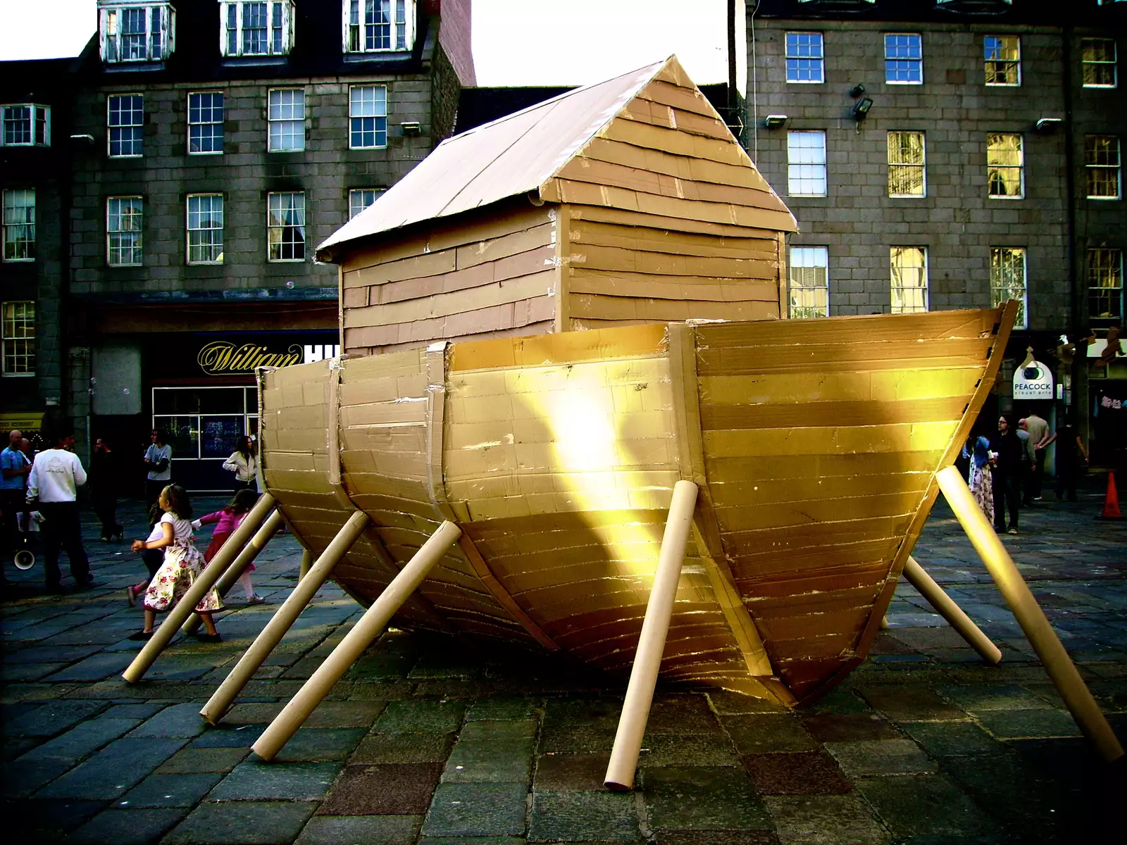 An ark created out of cardboard as part of an outdoor installation