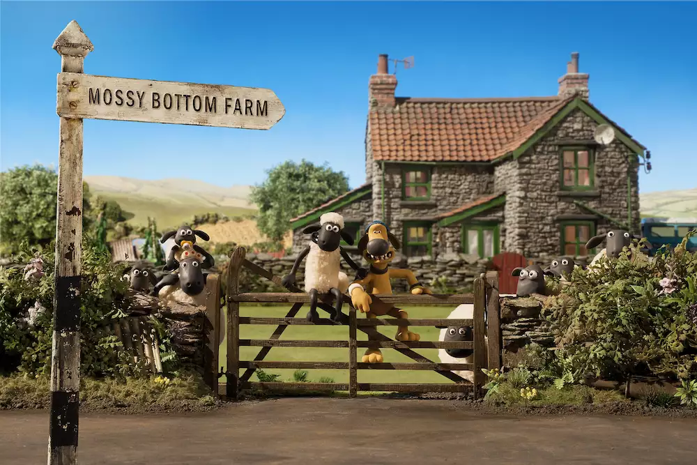 Shaun the Sheep and Bitzer outside Mossy Bottom Farm