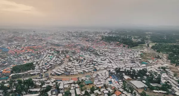 Still from Ai Weiwei's film 'Rohingya' showing an aerial view of a large refugee camp