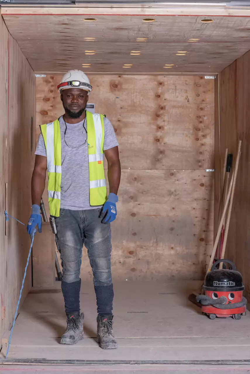 Photograph of a worker by Ming de Nasty