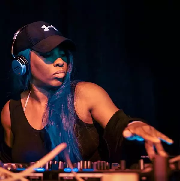 A photo of DJ Sequinella at the decks