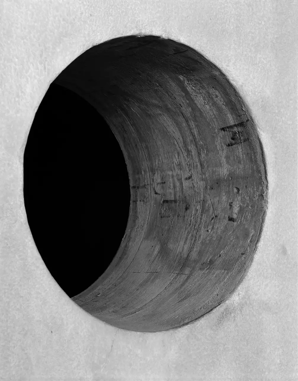 black and white photograph of a circular structure during the Aviva Studios build