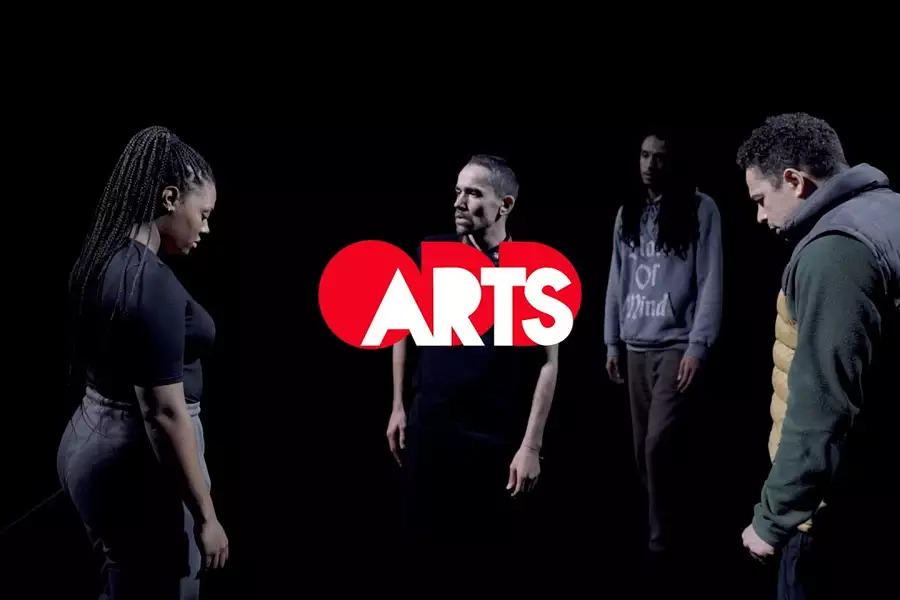 Photo of four people with the words 'Odd Arts' in the centre