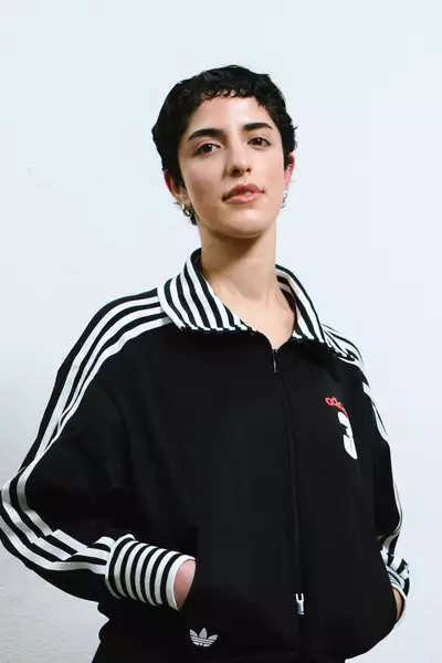 Liliana Munoz Flannery wearing a black Adidas jacket