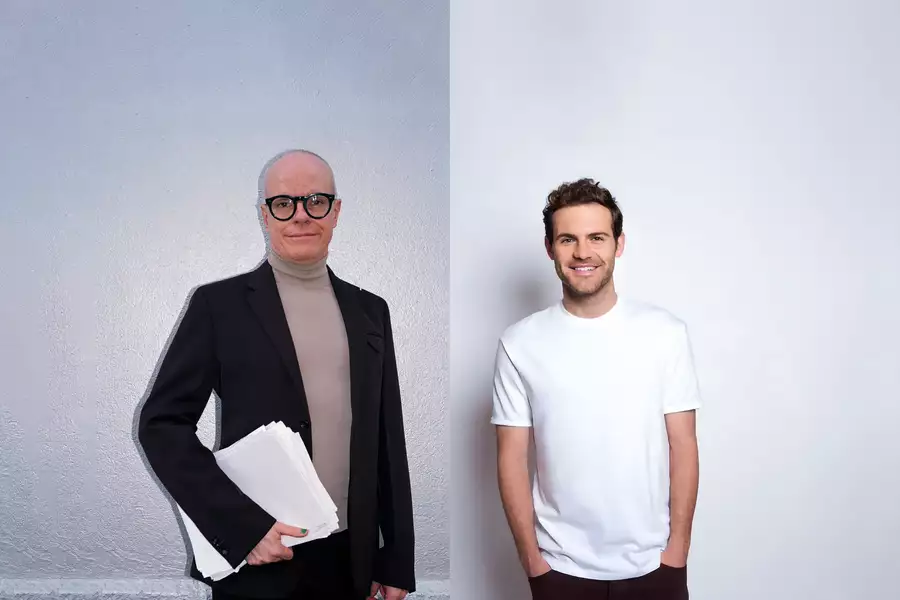 Hans Ulrich Obrist and Juan Mata in front of a white background