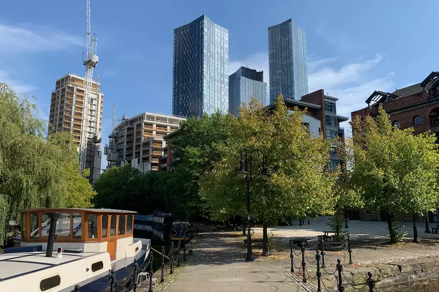 Photograph of a Manchester canal and skyscrapers