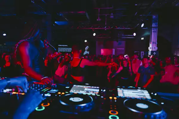 A crowd of people dancing in the Social to a DJ