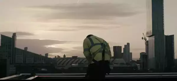 A construction worker building Aviva Studios