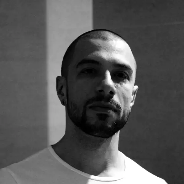 Black and white headshot of Marko Nikodijevic