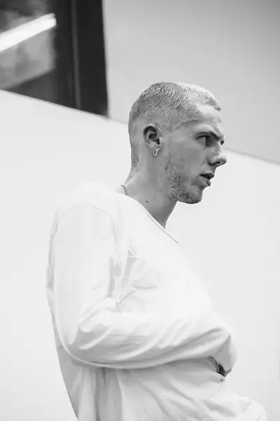 Headshot of Isaac Glenister