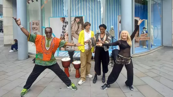 Group shot of members of the dance out percussion team